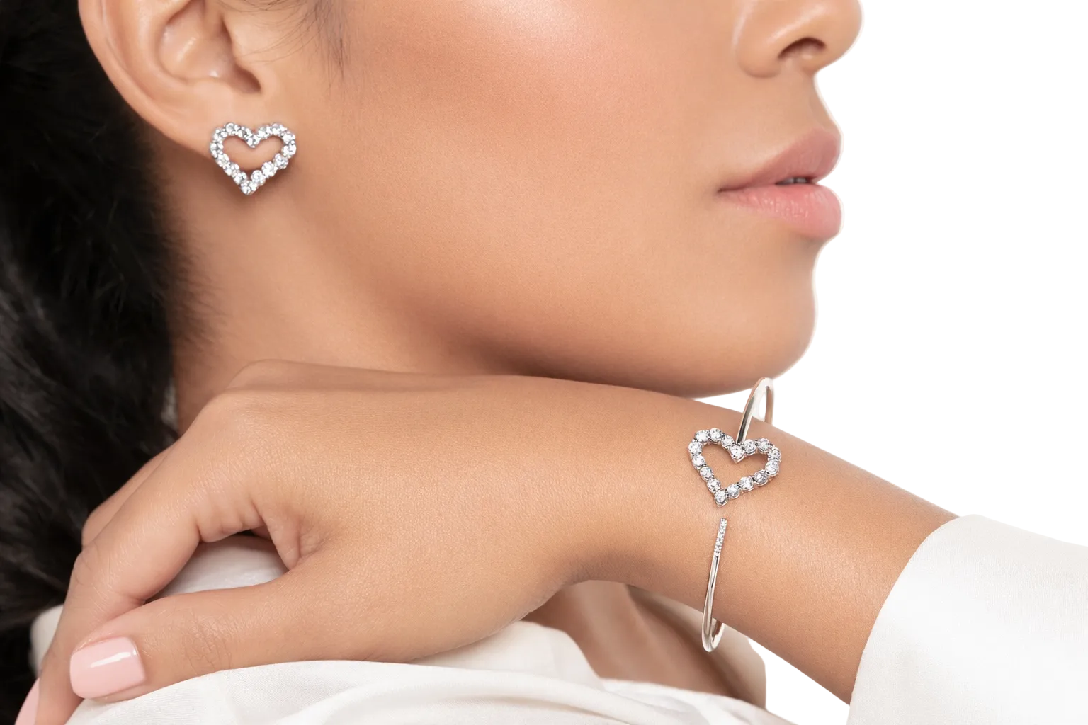 model wearing a diamond bracelet open heart