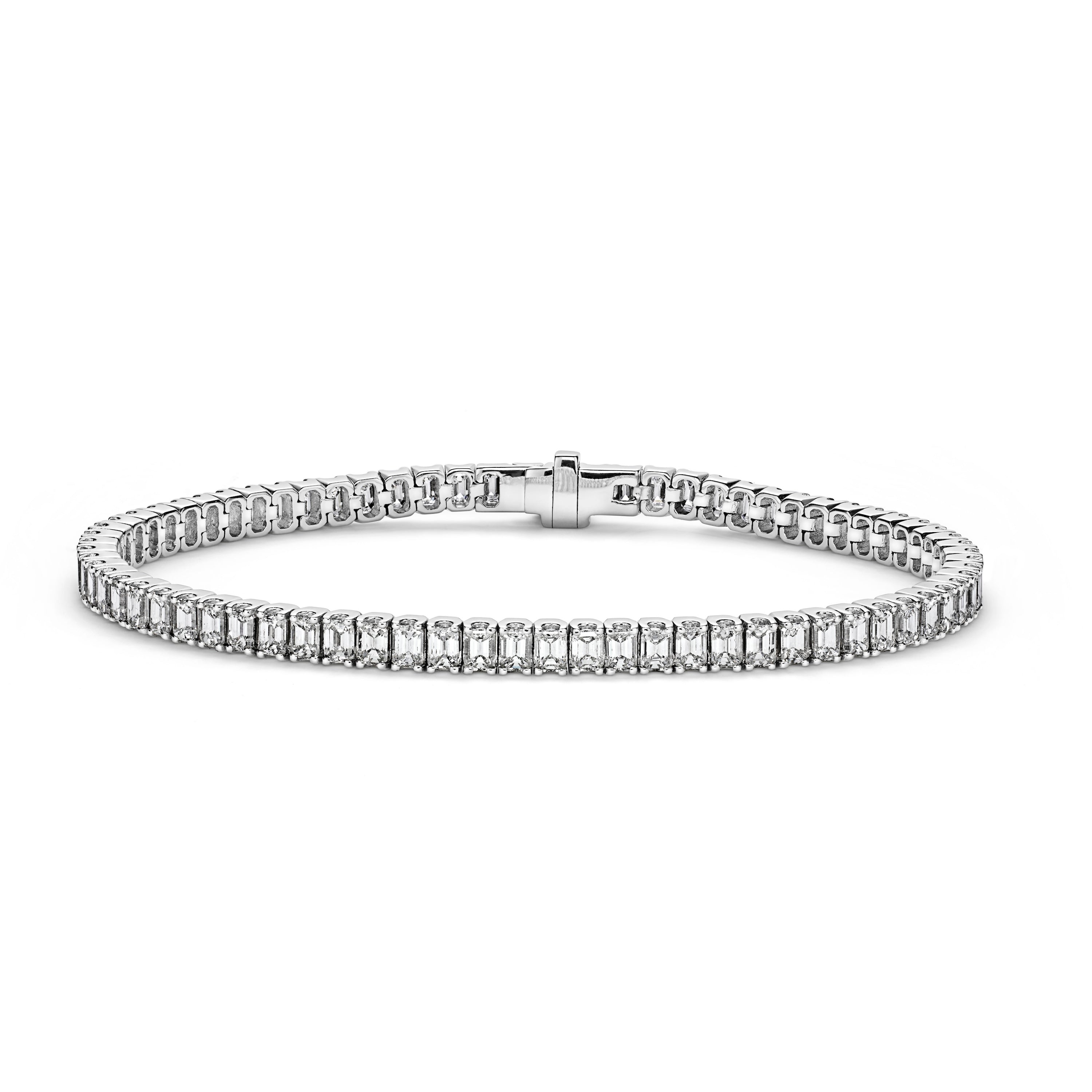 Diamond emerald cut tennis bracelet in white gld